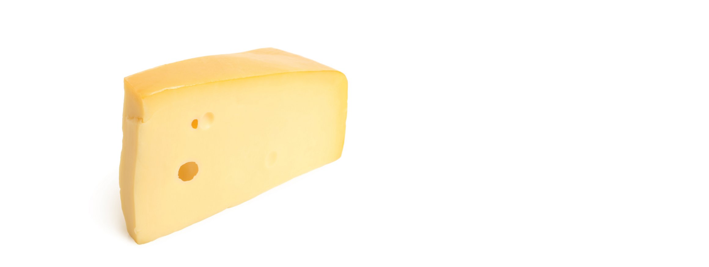 Ein großes Stück Käse mit Löchern