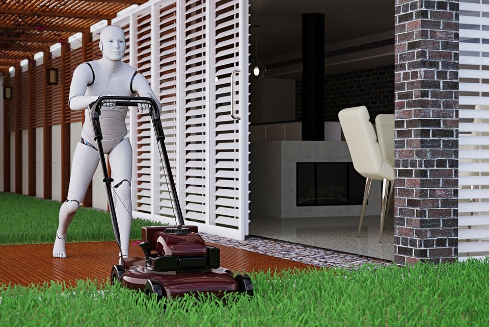 Ein weißer Roboter mäht im Garten den Rasen anstelle eines Menschen